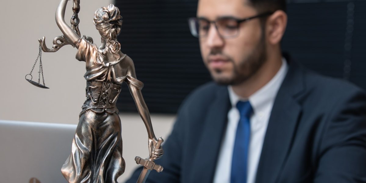 Professionals engaged in a discussion about navigating new AI regulations and ensuring compliance with ethical guidelines.