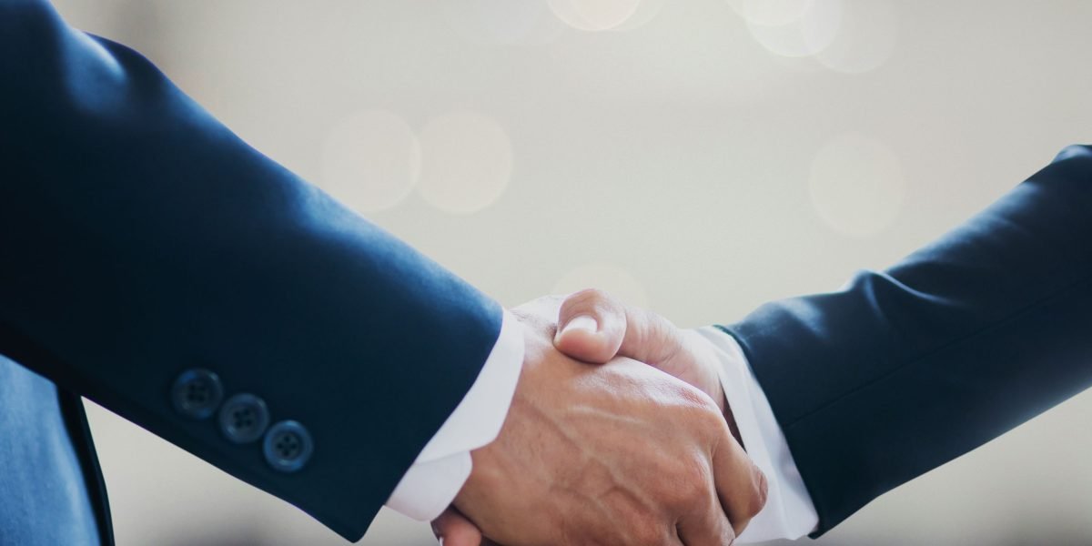 Professionals working collaboratively to establish transparent data governance and ethical practices for AI systems.