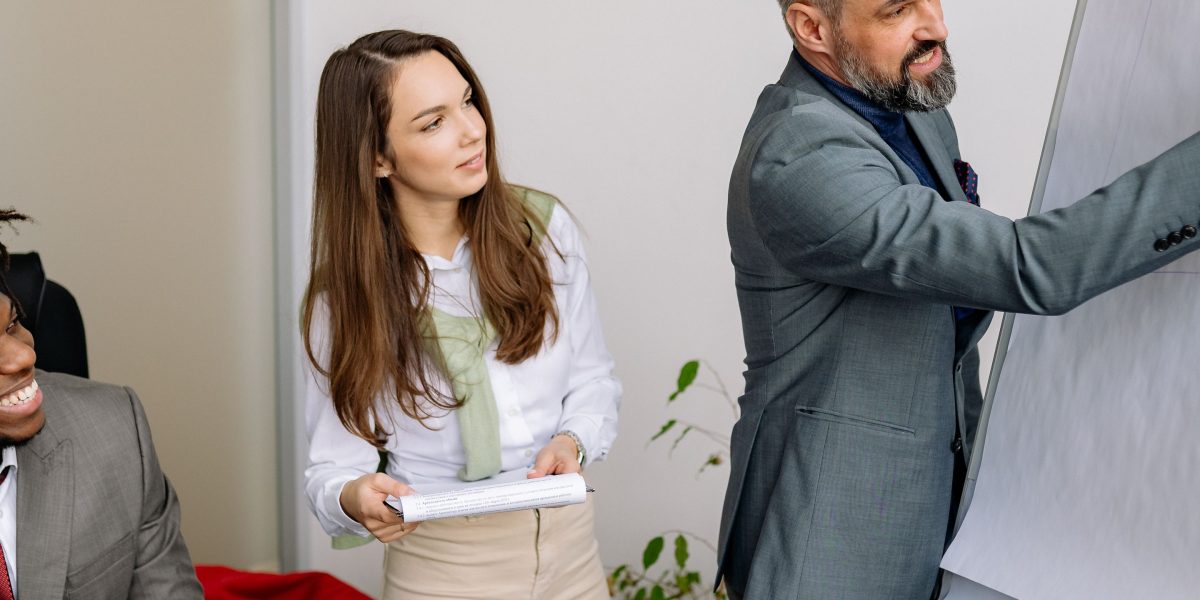A confident presentation or discussion focused on building trust, symbolizing the effort required to ensure AI systems are ethical and reliable.