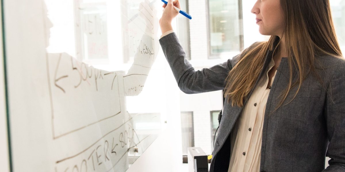 A person engaged in learning or training, reflecting continuous professional development.