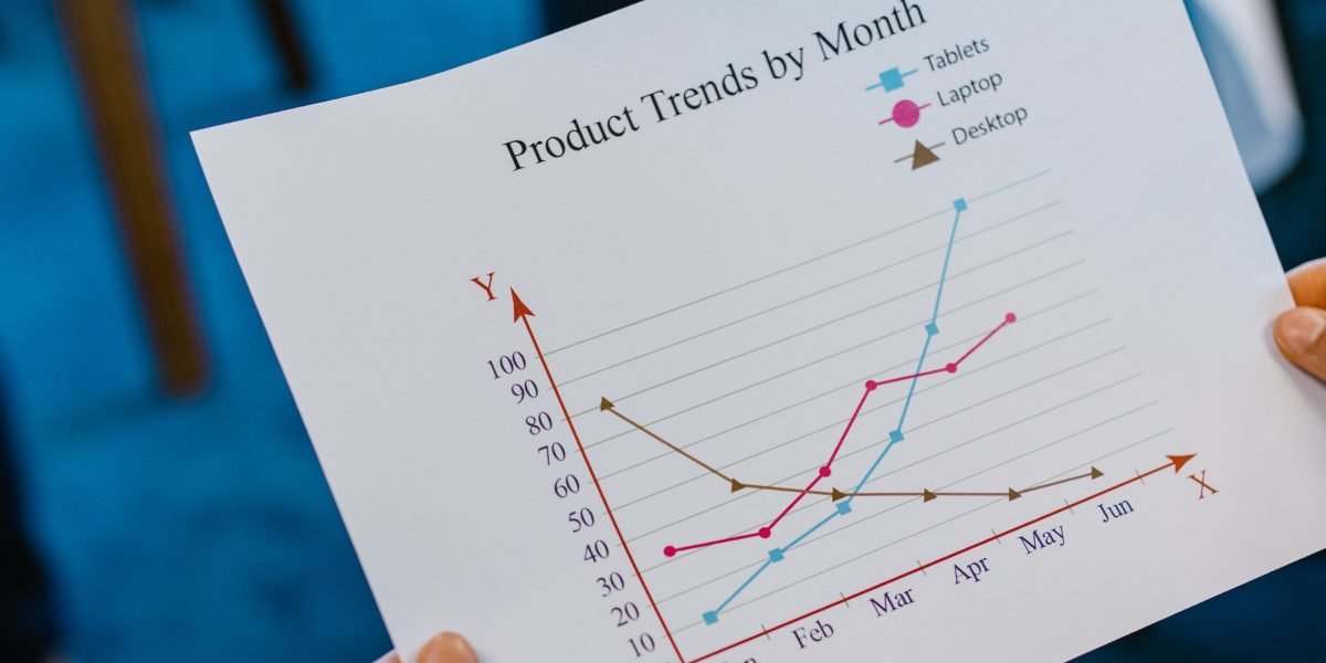A business professional diligently reviewing performance metrics to ensure quality and compliance of AI systems.