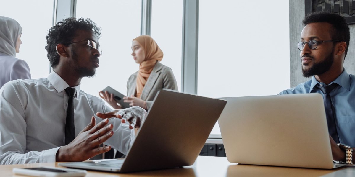 Leaders collaborating to build trustworthy AI systems that promote truth and clarity.
