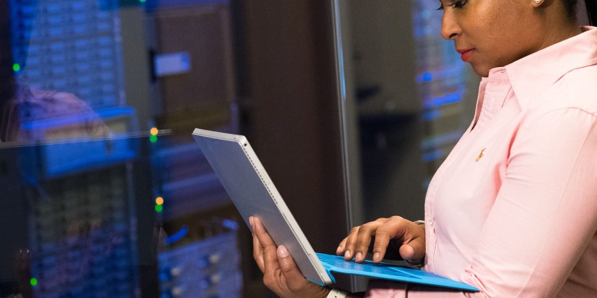 An individual managing their data permissions on a digital device, highlighting control over personal information.
