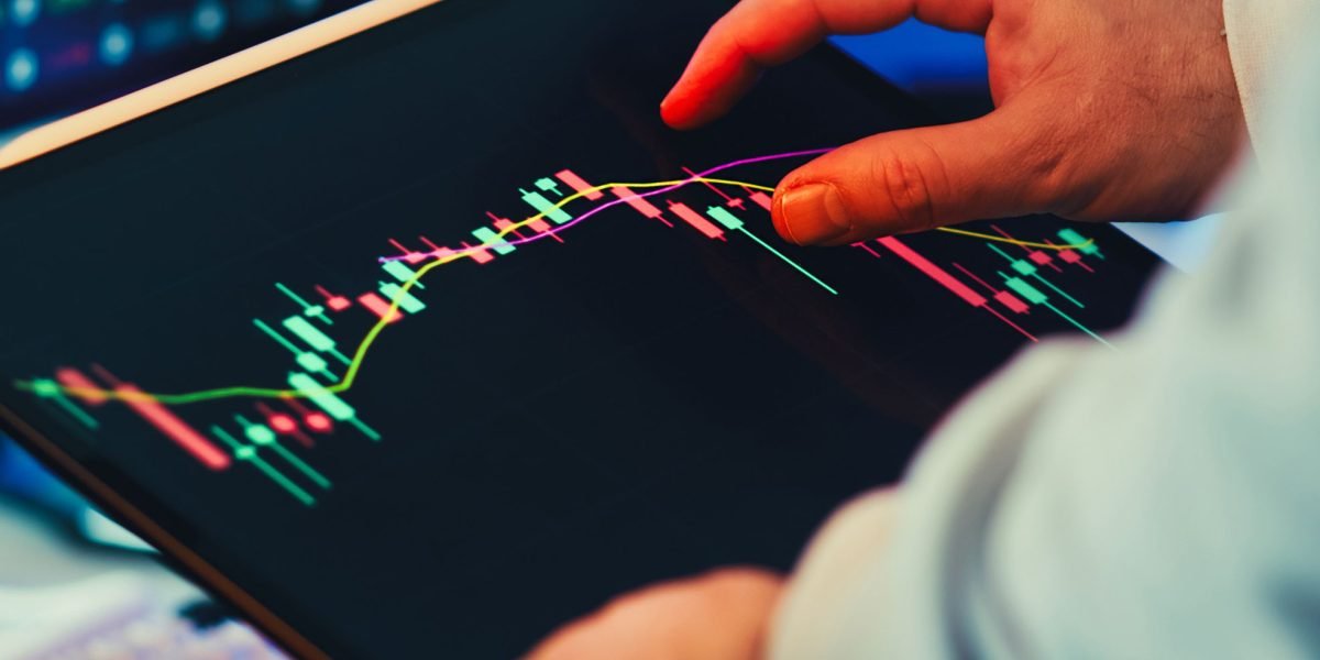 A business professional reviews a digital dashboard, analyzing performance metrics to ensure AI fairness and accuracy.