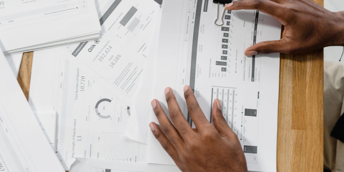 A business intelligence team analyzing reports and dashboards, leveraging operationalized datasets to inform strategic decisions.