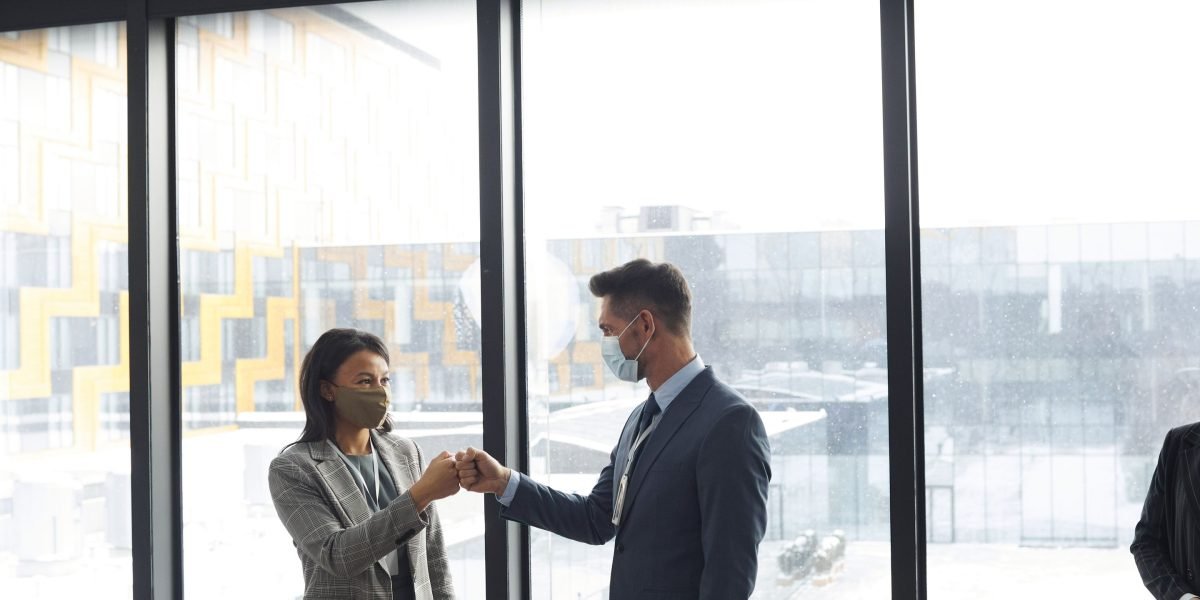 Executives in a boardroom, strategizing on AI governance and policy implementation.