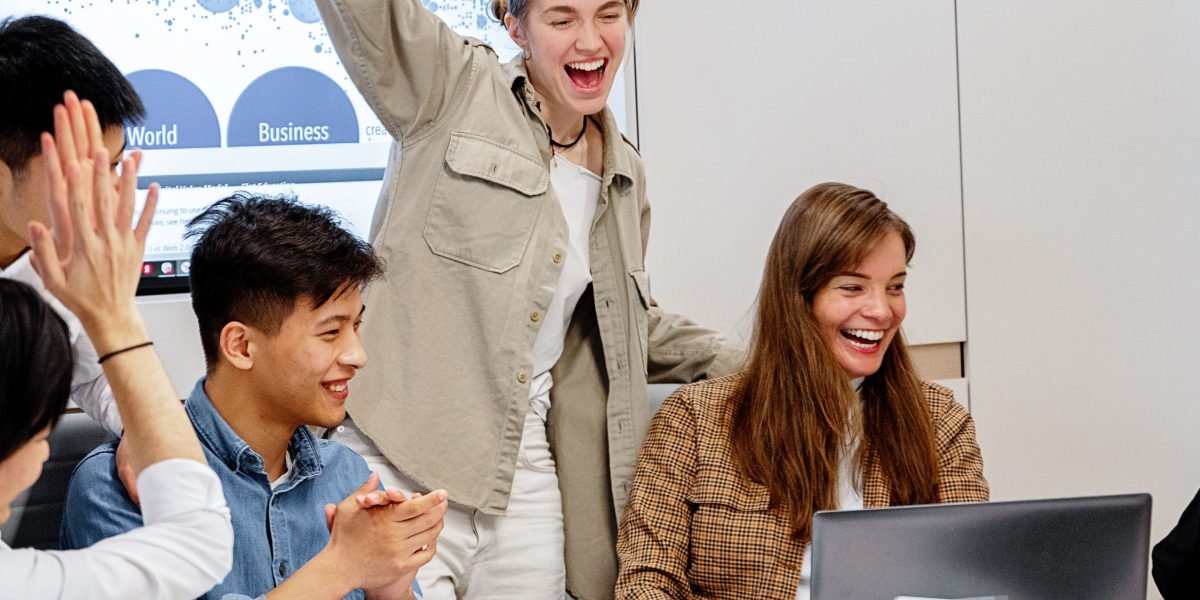 A team celebrating a successful project, emphasizing the positive outcomes of data-driven strategies.