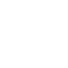Black silhouette of a dog walking with visible tail and ear shapes.