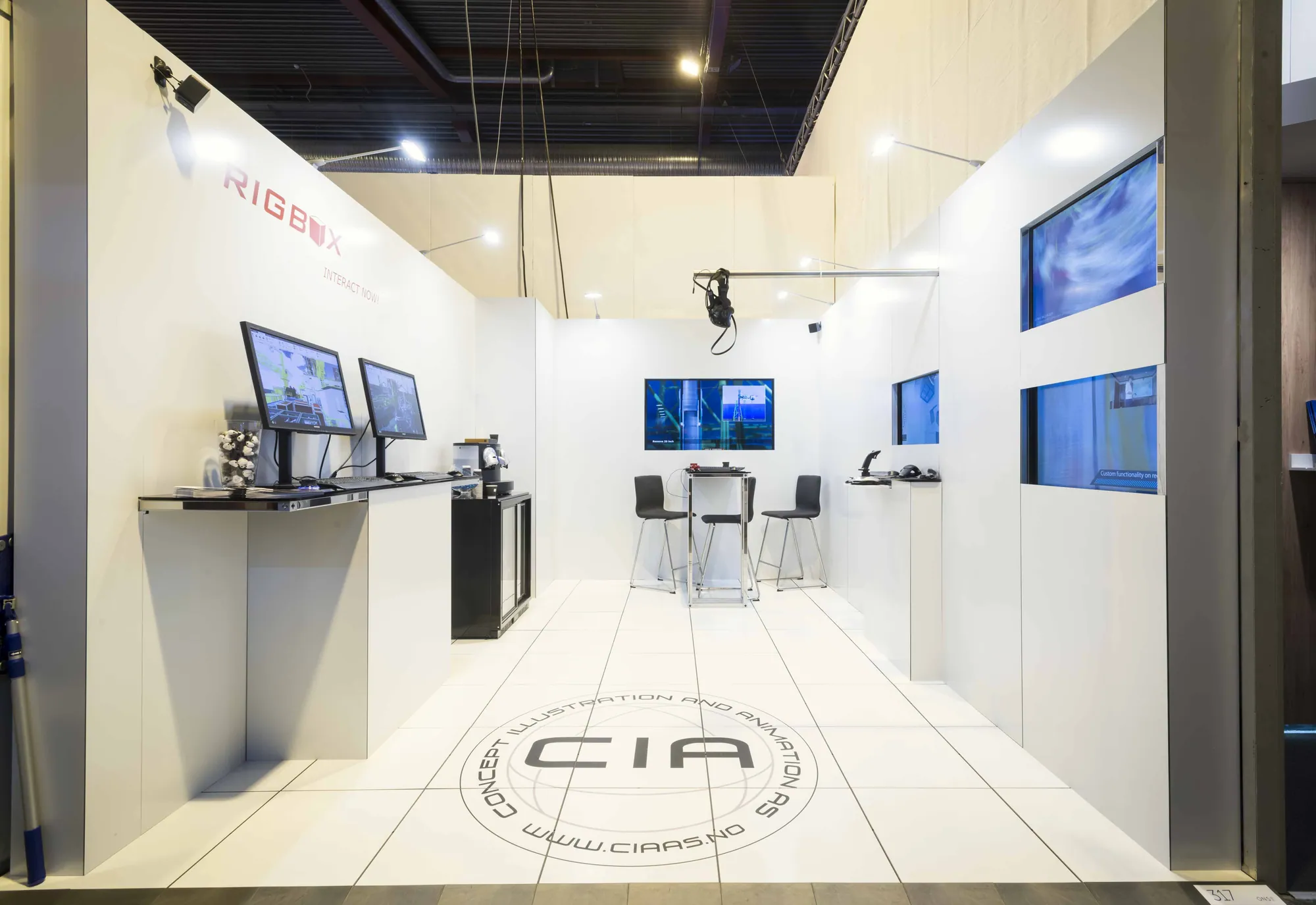 White modular stand with product demonstration screens