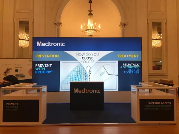 Front view of a modular lightbox stand with display cabinets and counter