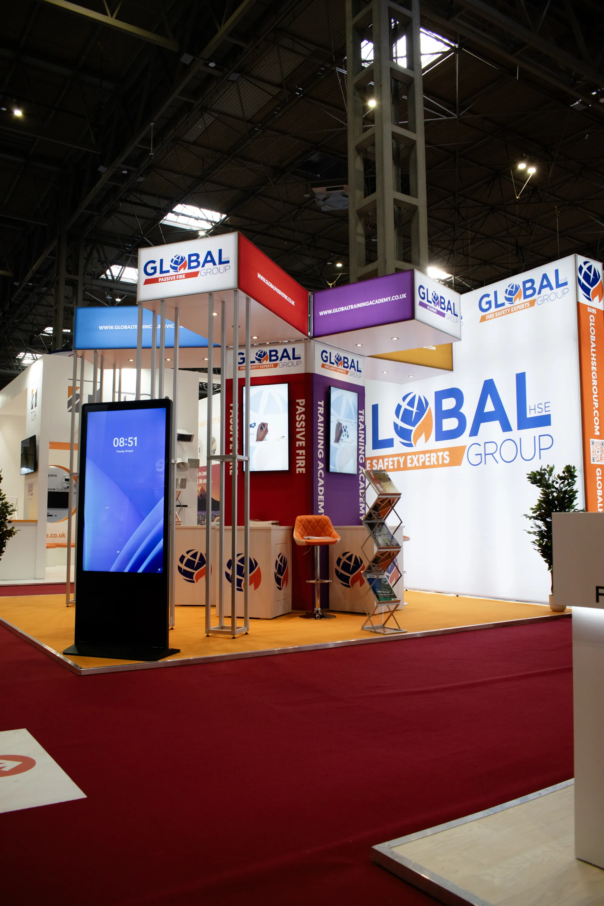 Multi-colour modular stand with lightbox towers and headers