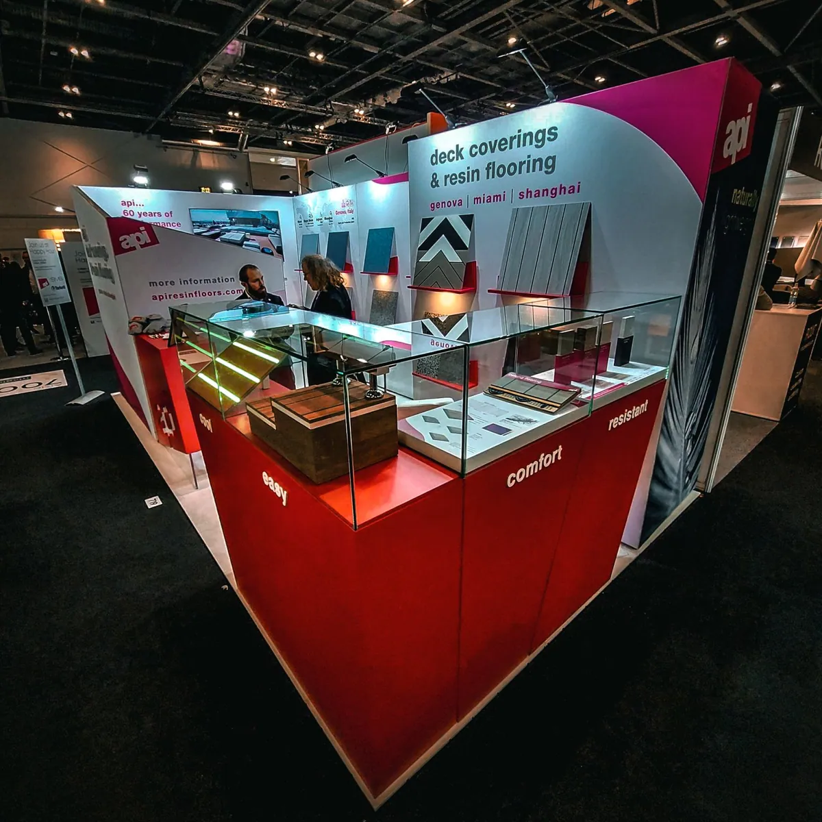Corner modular stand with glass display counter and fabric graphics