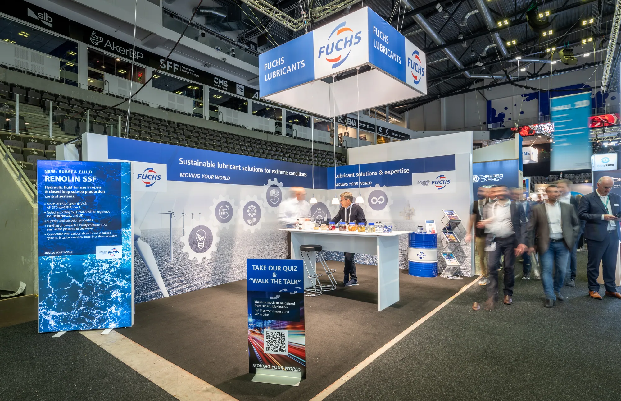 Energy sector exhibition stand with hanging sign and backlit graphics