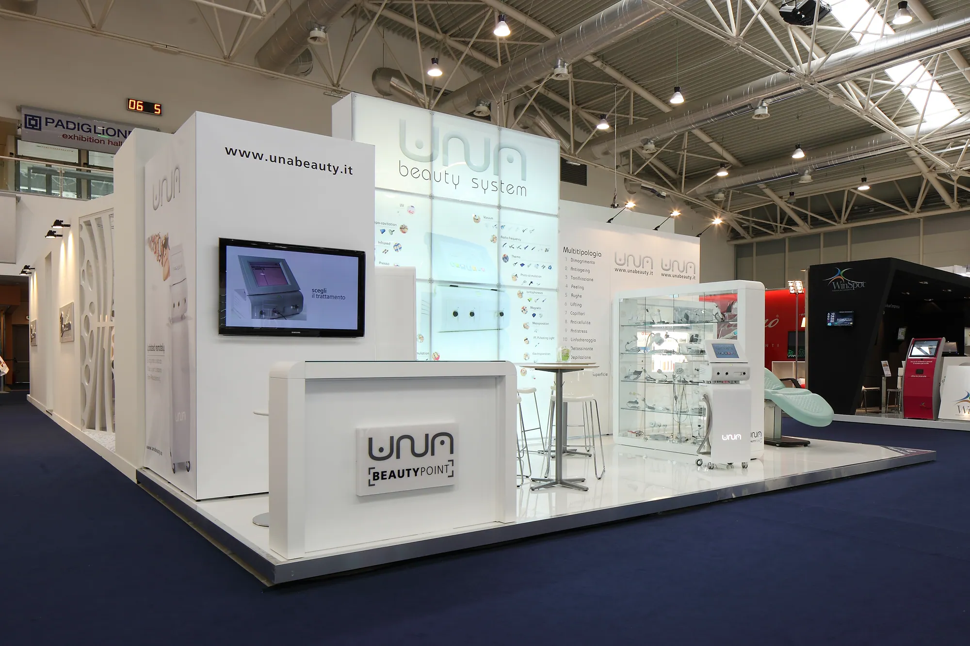 White beauty-brand island stand with product display cabinets