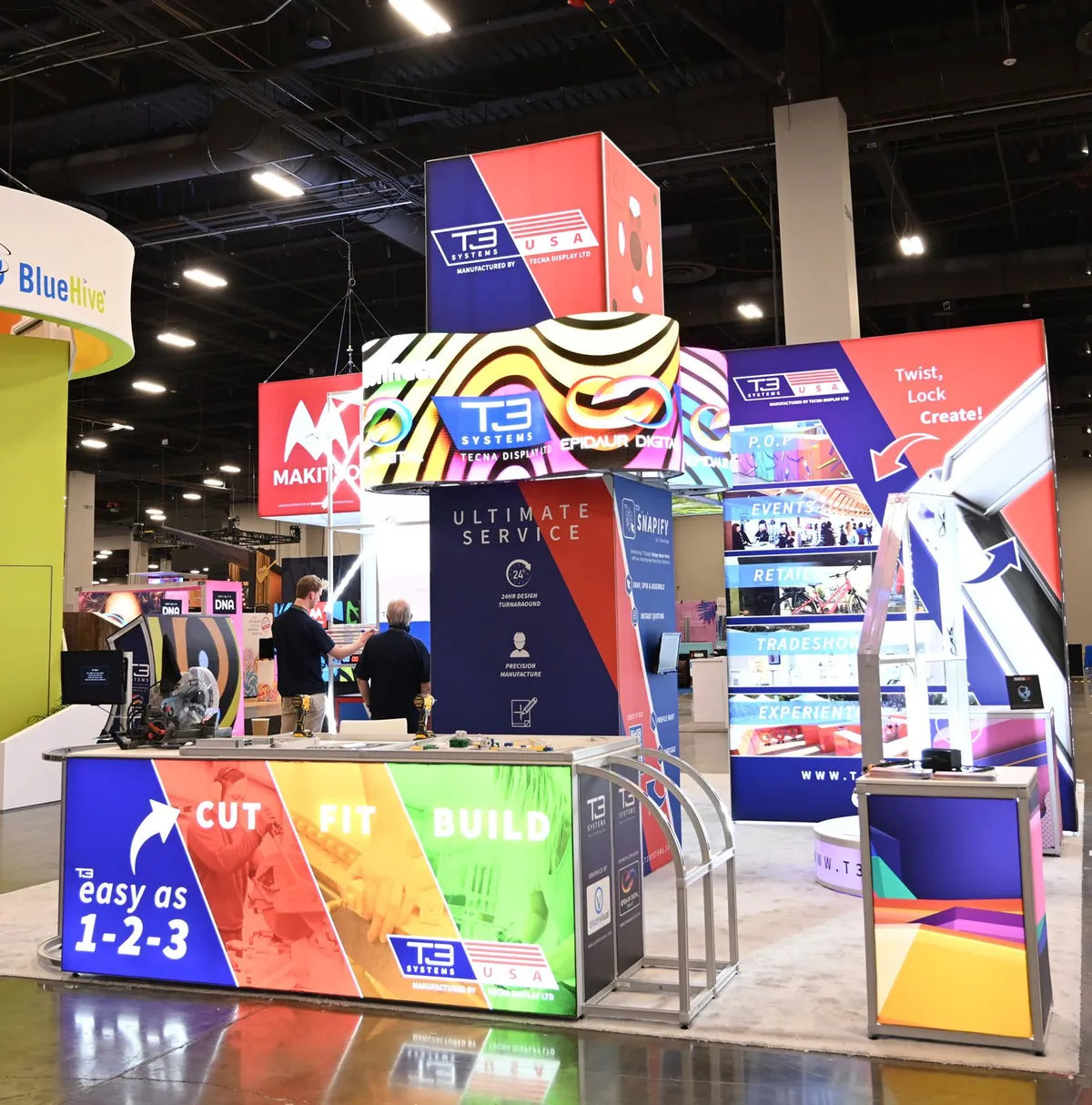 Multi-level T3 lightbox exhibition stand with integrated counters