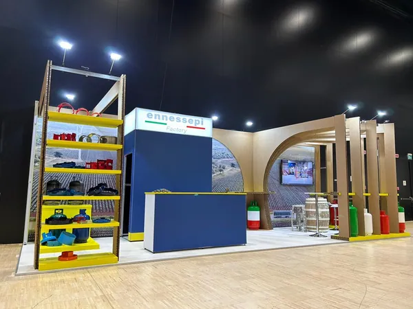 Custom stand with timber-effect arches and product shelving built with T3