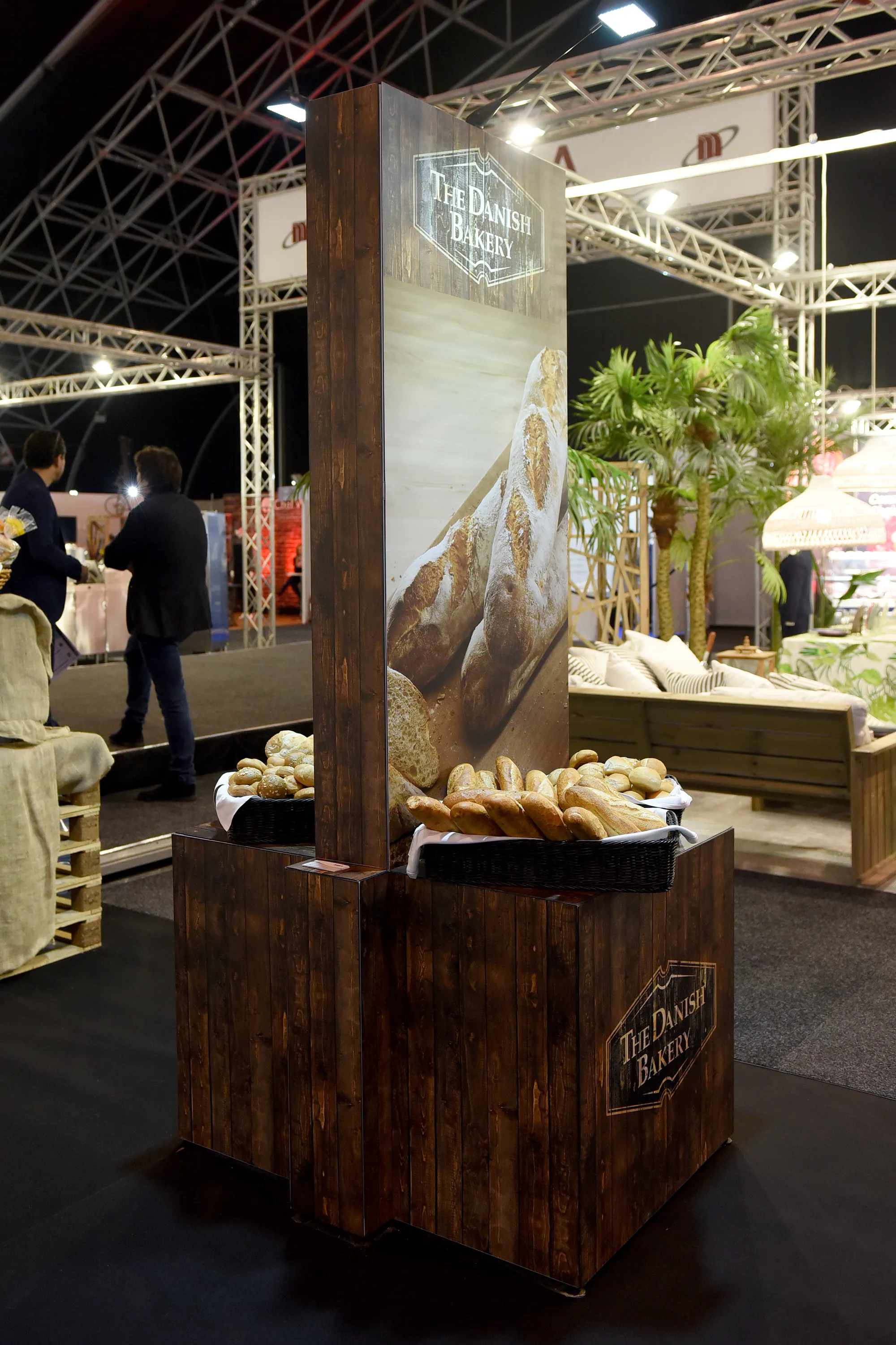 Timber-effect bakery product display tower built with T3