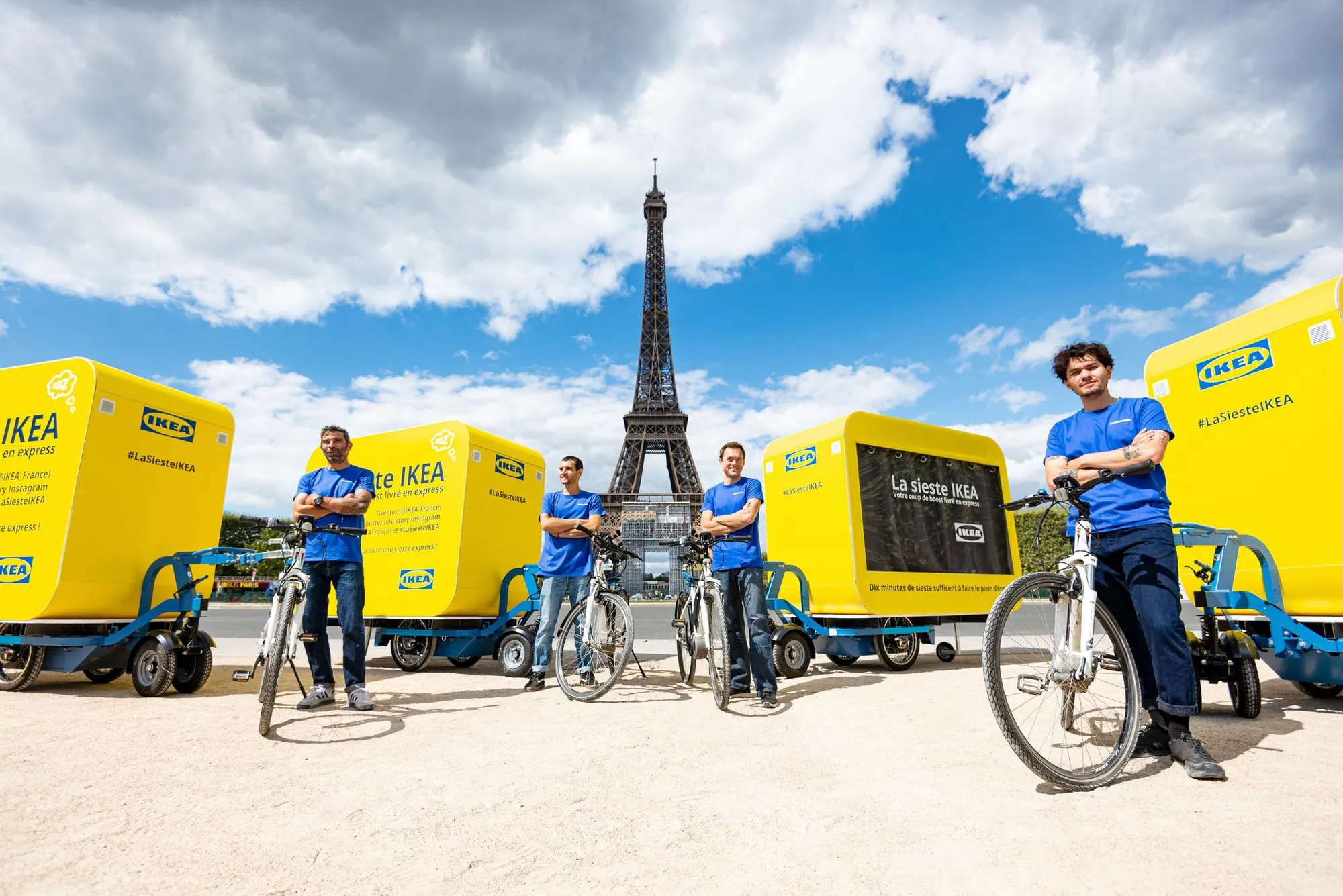 Branded cargo bike pop-up pods built with T3 in front of the Eiffel Tower