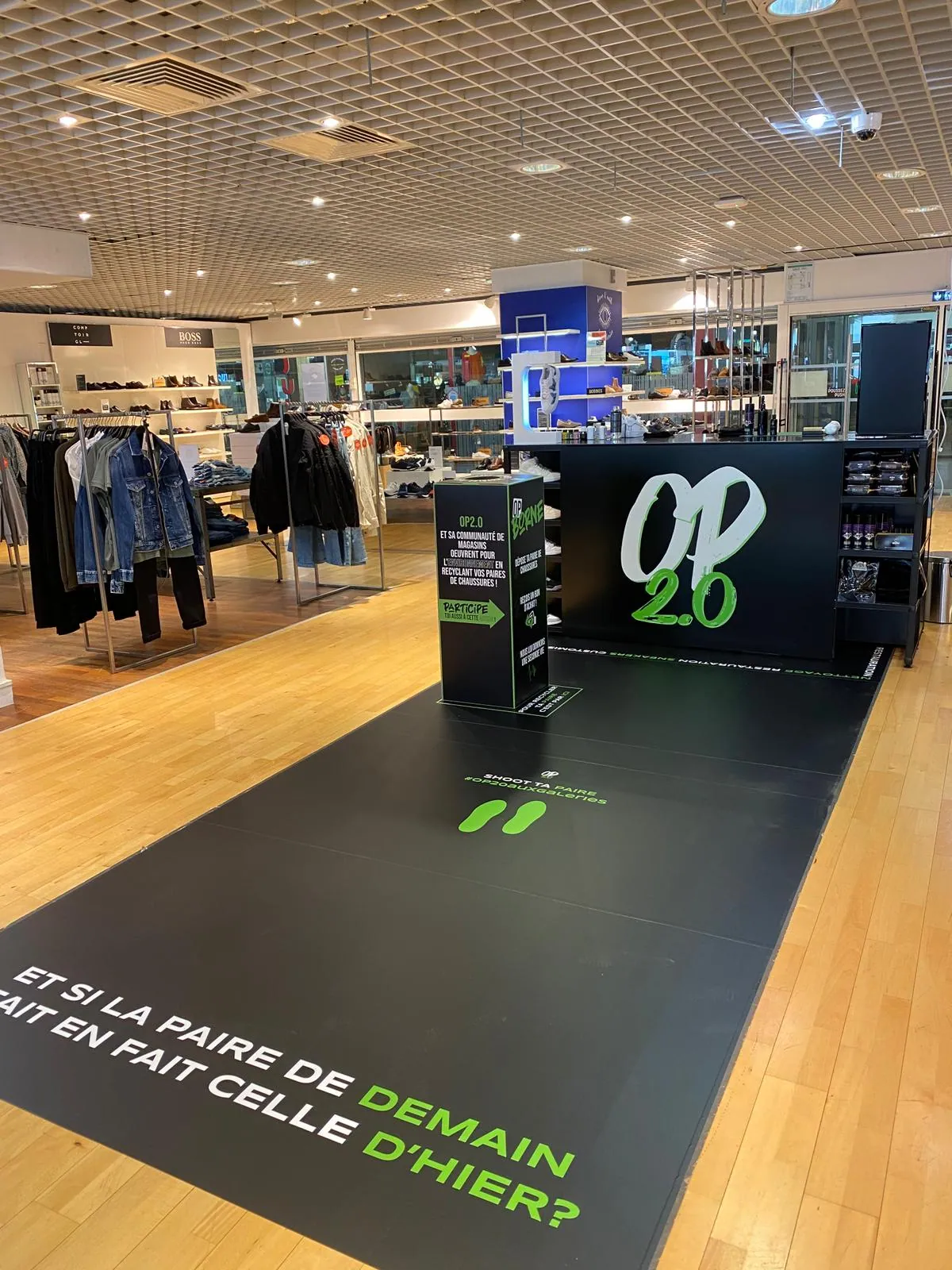 Footwear retail pop-up with branded floor graphic built with T3