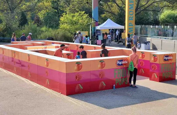 Outdoor branded maze built with T3 panels at a public event