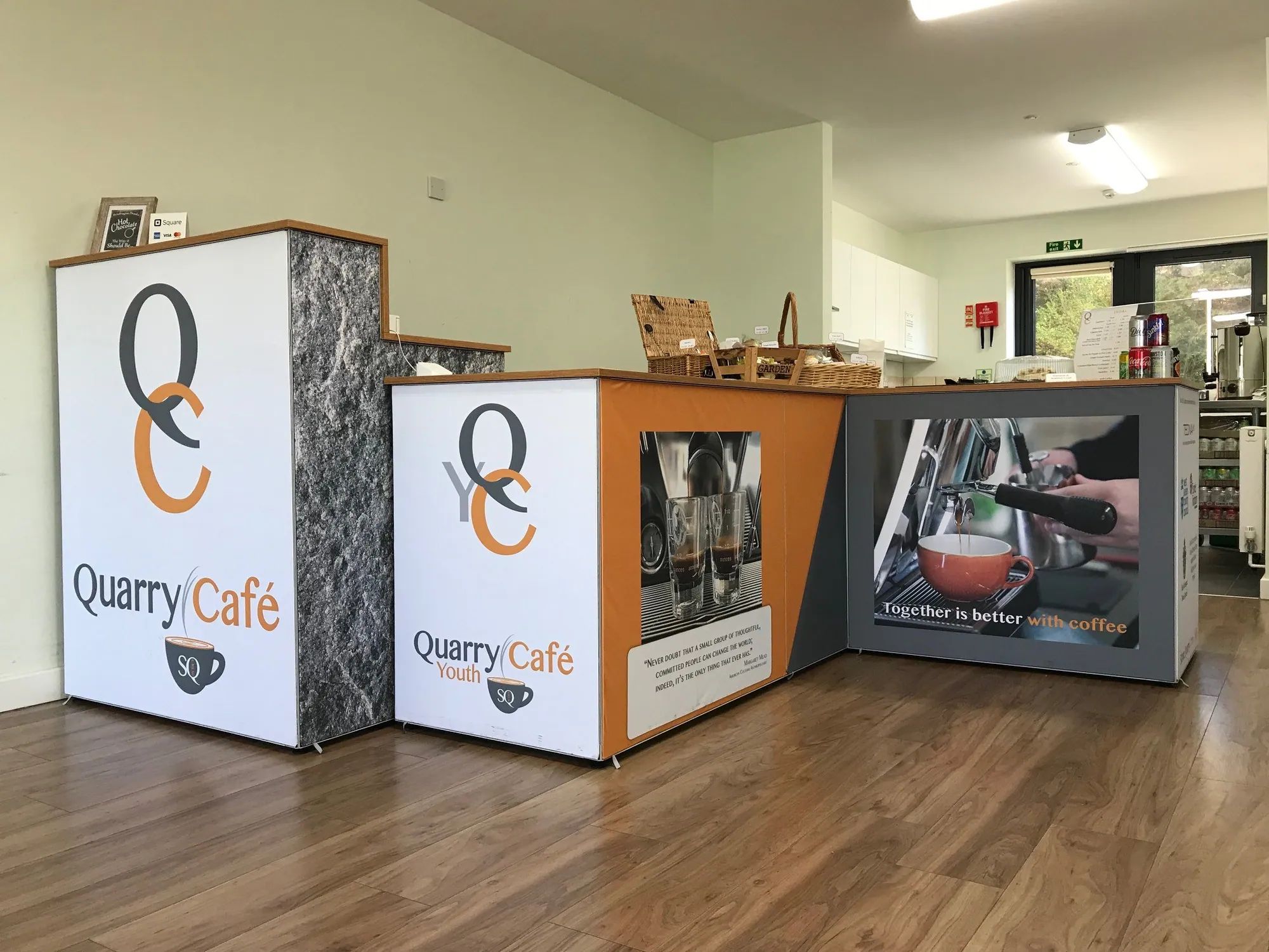Café service counters with printed graphic wraps built with T3
