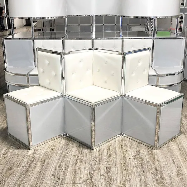 Modular corner lounge seating with buttoned upholstery on a T3 frame