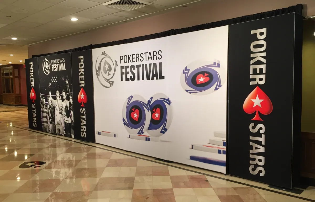 Event backdrop wall with branded panels built with T3