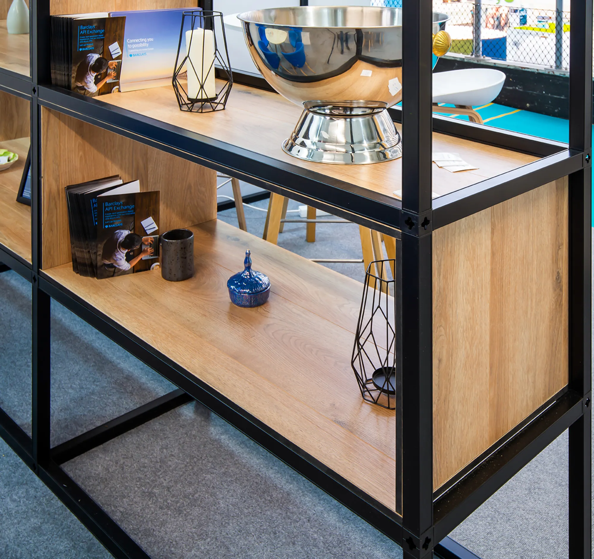 Black T3 Deco frame shelving with timber shelves and decor
