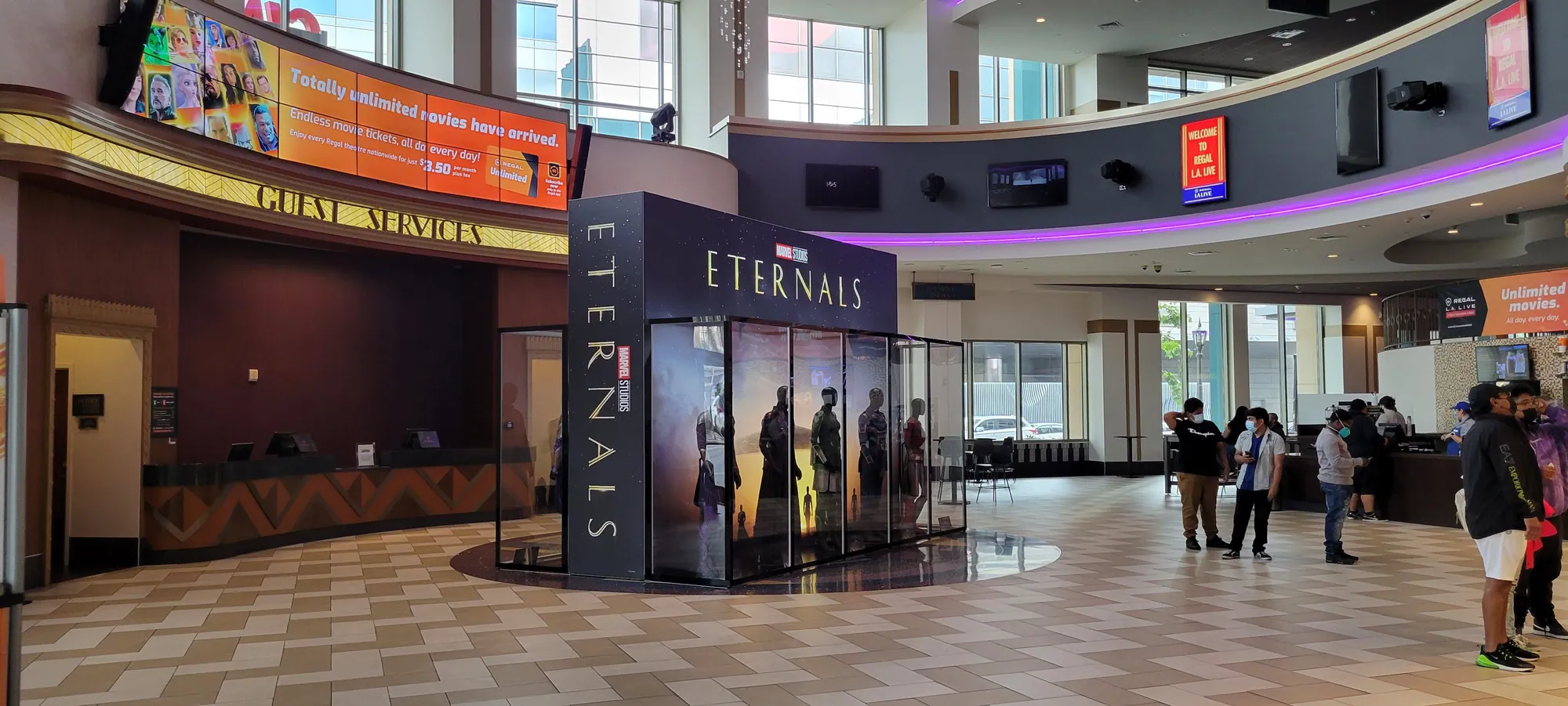 Glazed costume display cases built with T3 Deco in a cinema lobby