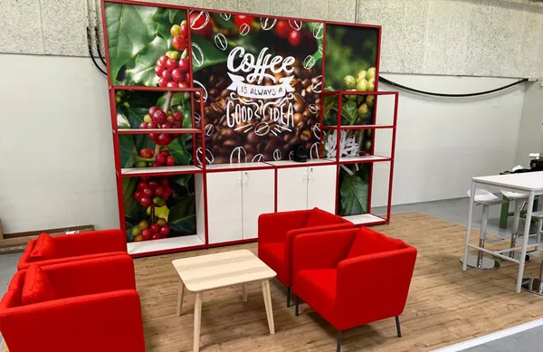 Red frame shelving wall and lounge seating built with T3