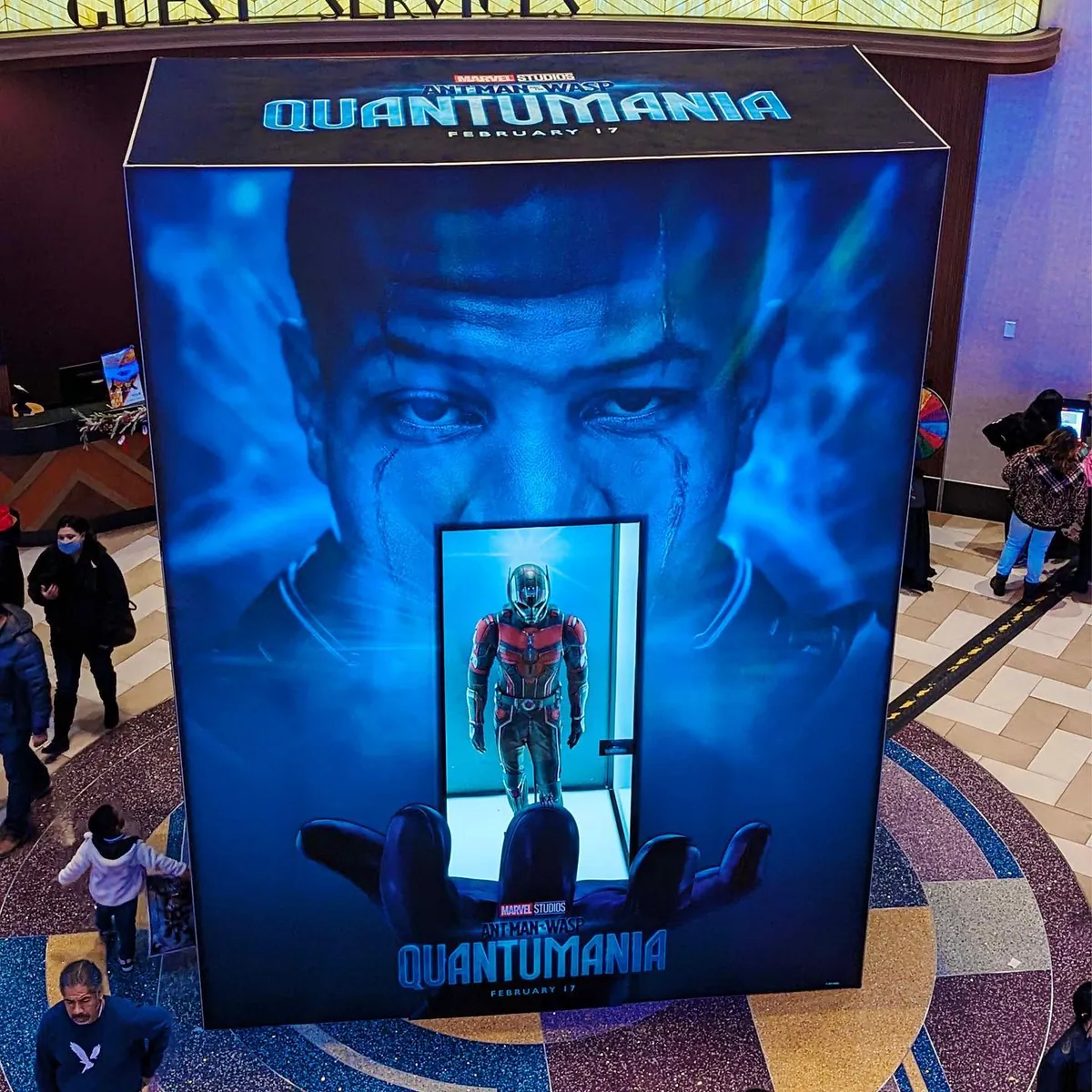 Branded film costume display cabinet in a cinema lobby