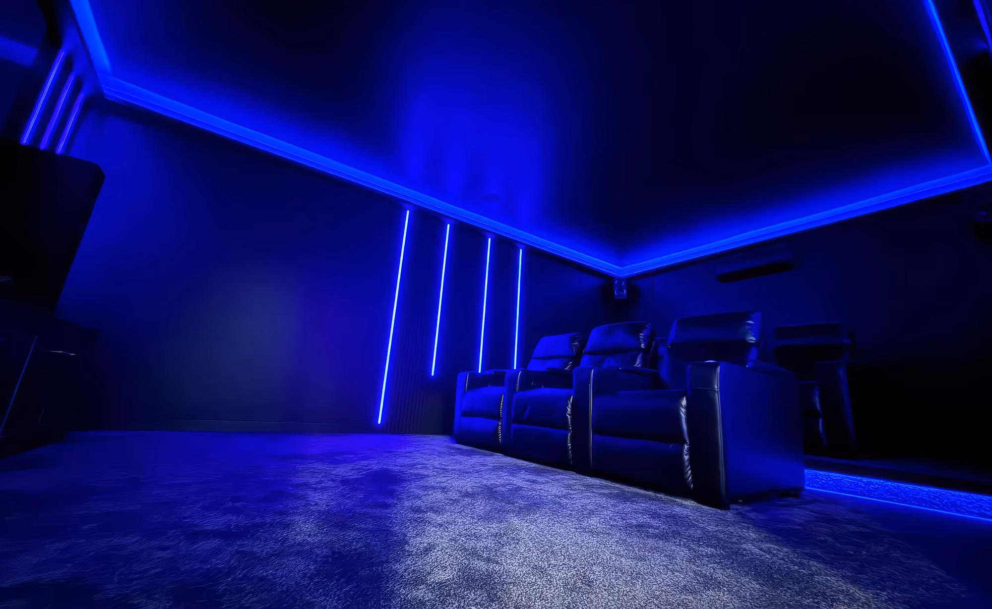 a room with blue lights and chairs
