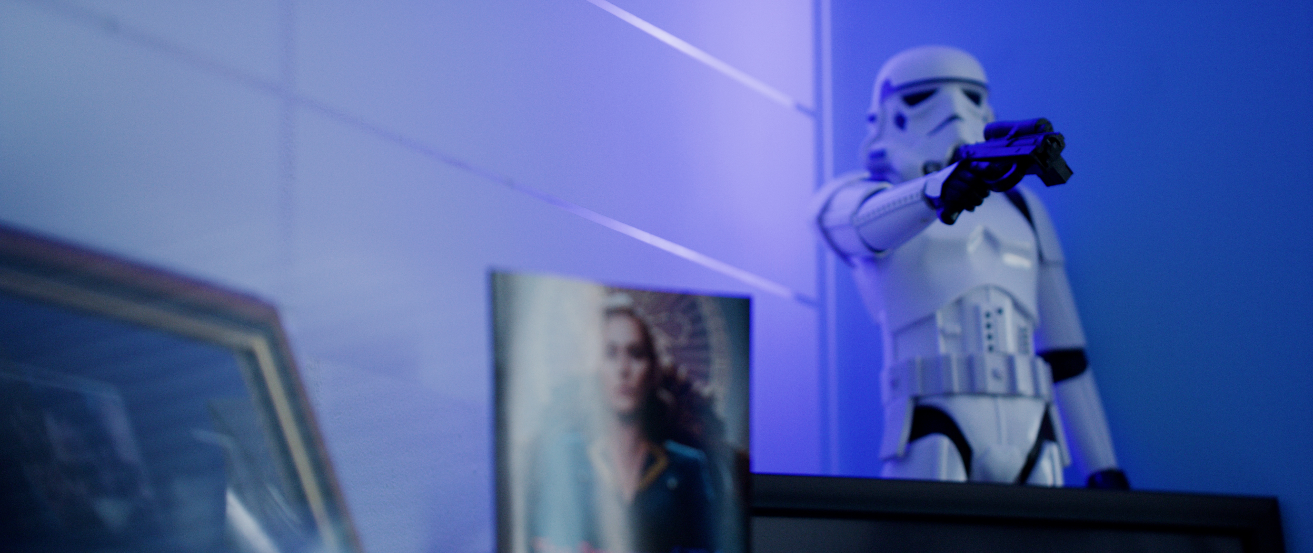 a white robot with a blue background