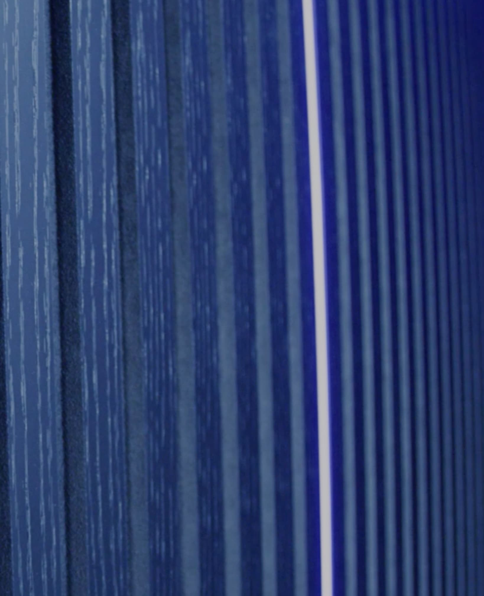 a close up of a blue wall
