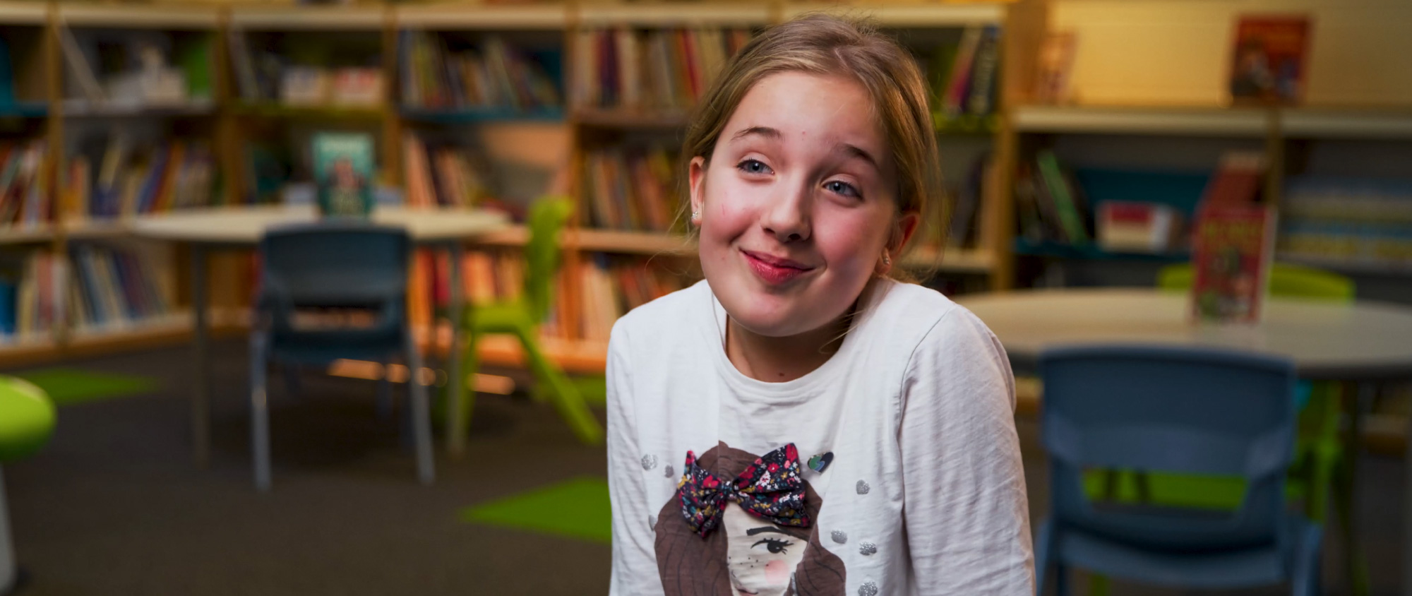 a girl smiling at camera