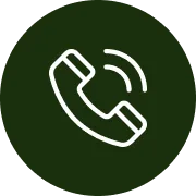 White telephone handset icon with sound waves on dark green circular background.