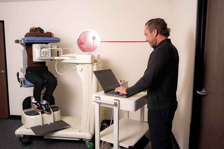 VIP Imaging certified nuclear medicine technologist performing a mobile SPECT nuclear stress test on a patient using portable cardiac imaging equipment