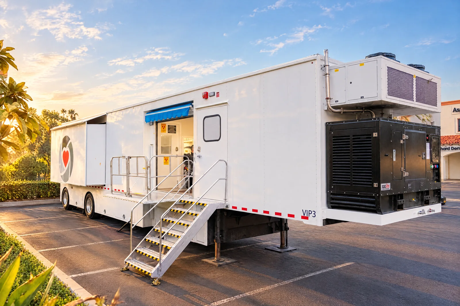 VIP Imaging PET/CT trailer with patient entry stairs and awning set up at a medical office