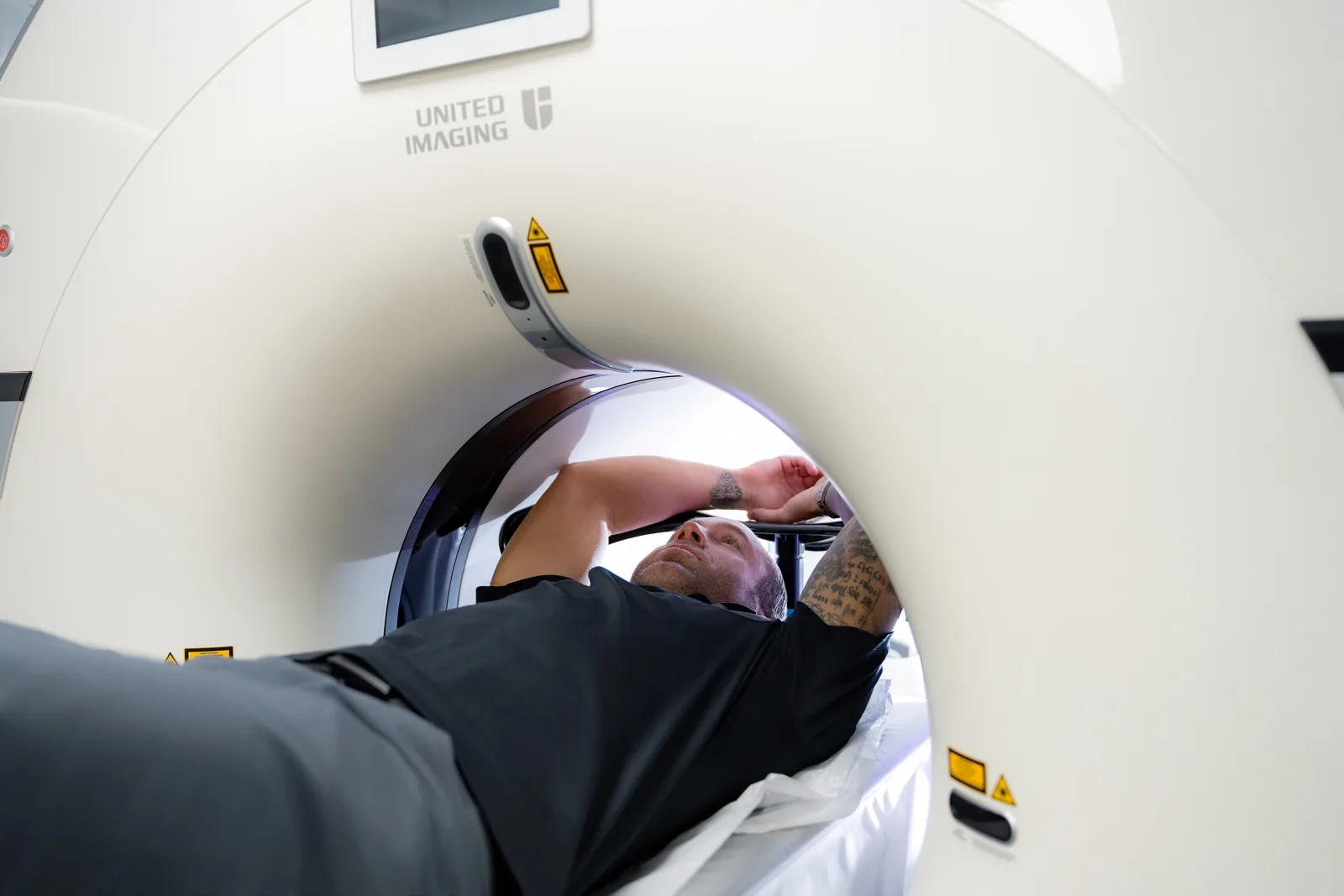 Patient inside the PET/CT gantry during a cardiac scan