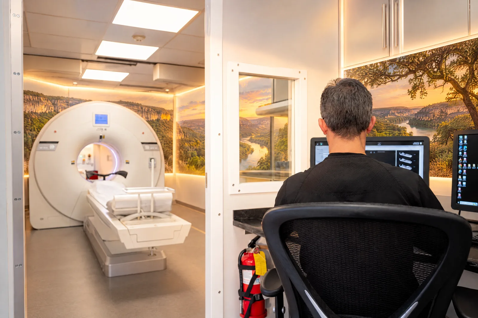 Technologist at the console of the VIP Imaging PET/CT unit