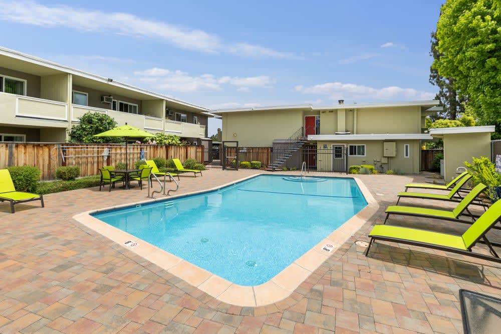 Swimming pool with lounge chairs
