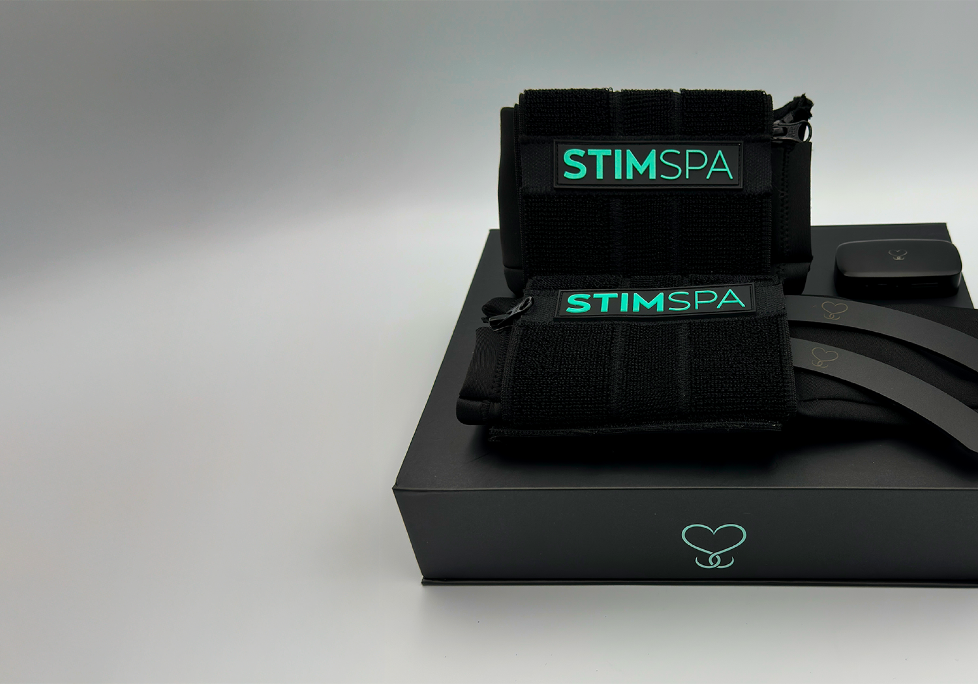 The StimSpa gLOVE with its packaging