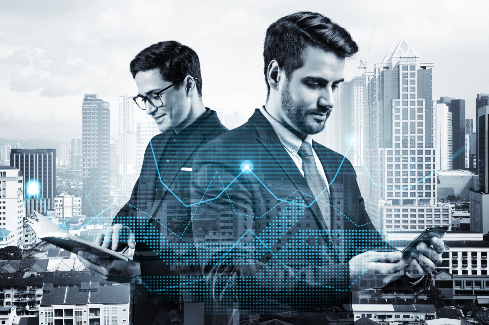 Two entrepreneurs in suits planning a venture capital startup investment