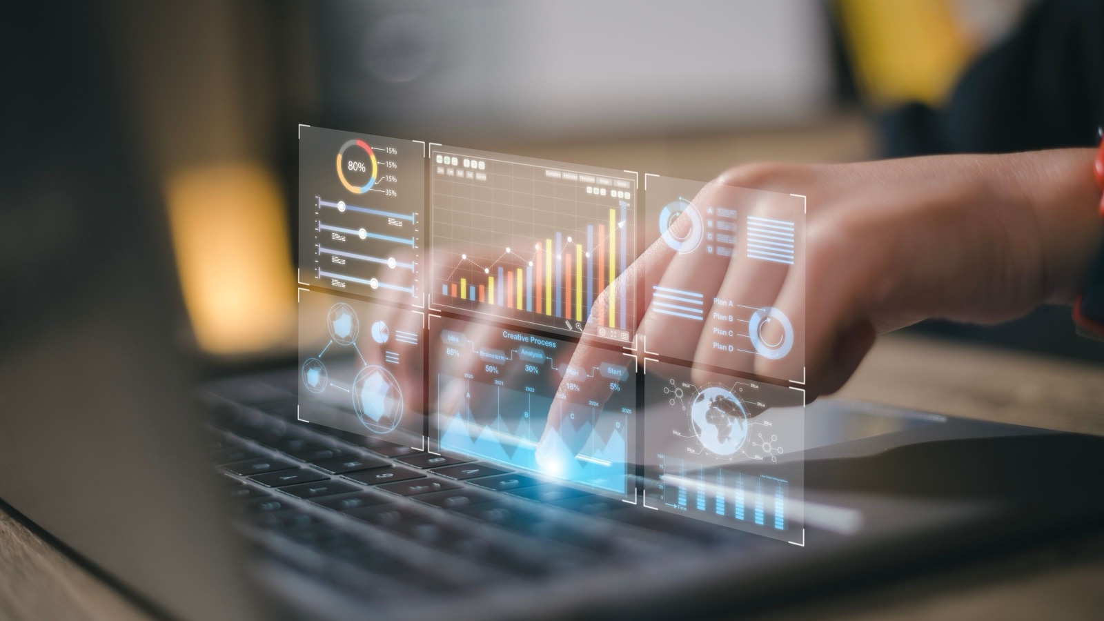 Analyst reviewing a business analytics dashboard with charts, KPIs and performance metrics