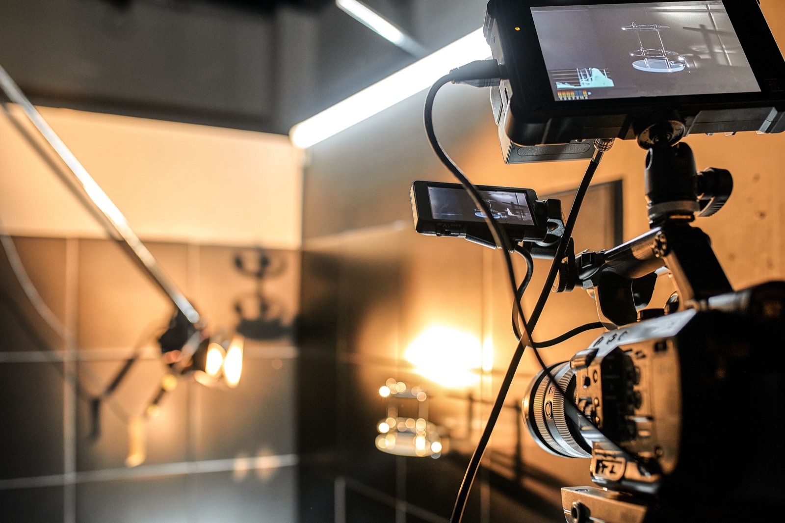 Film crew setting up camera and sound equipment on a movie set