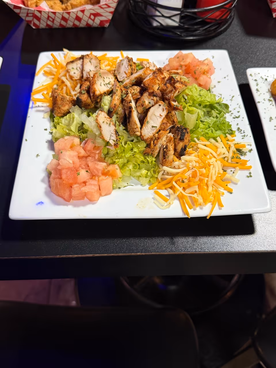 chicken salad with cheese and tomatoes