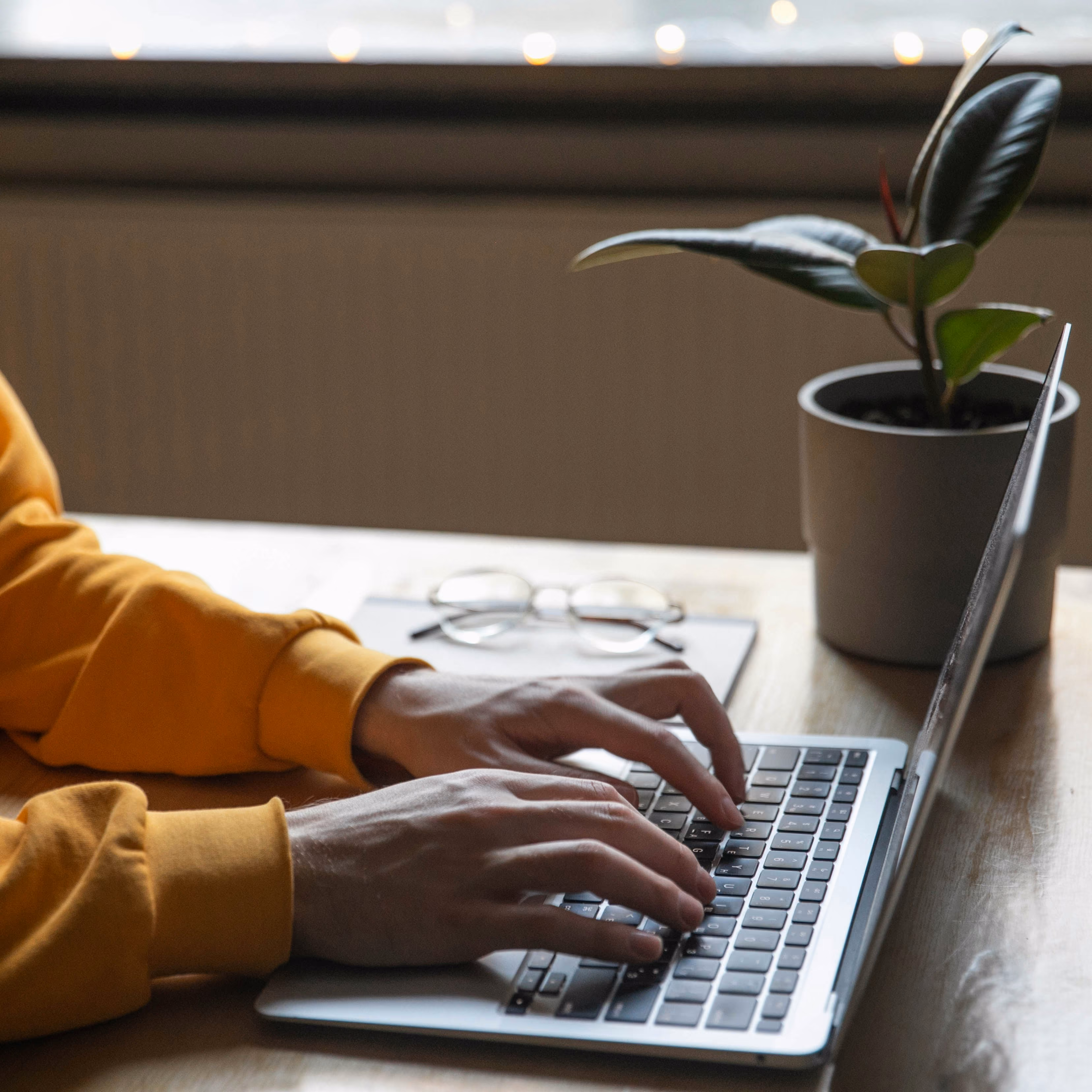 A client-side reviewer and a Maven linguist working through translated content together.