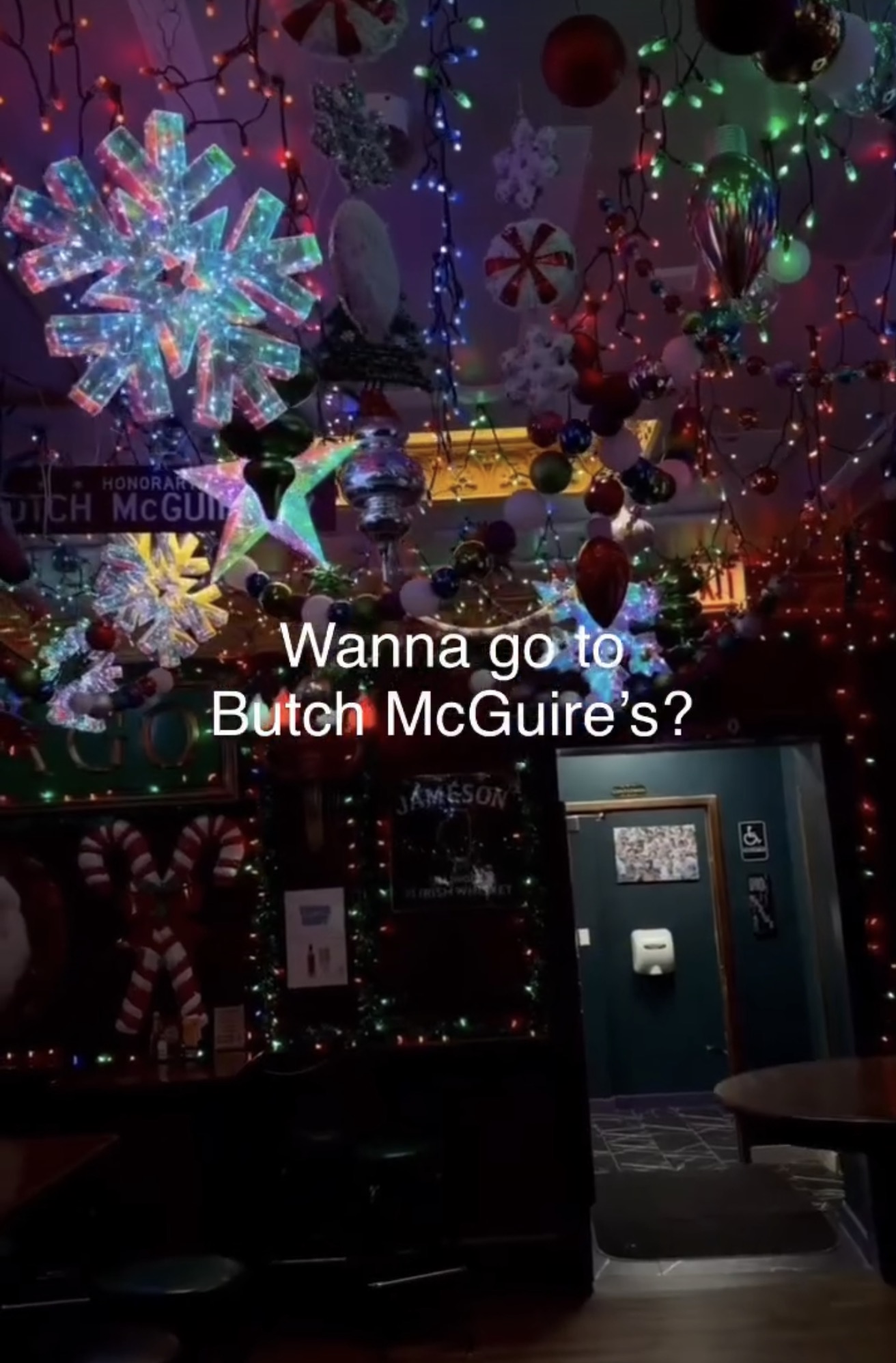 Nutcrackers and a neon truck sign in the Christmas-decorated bar