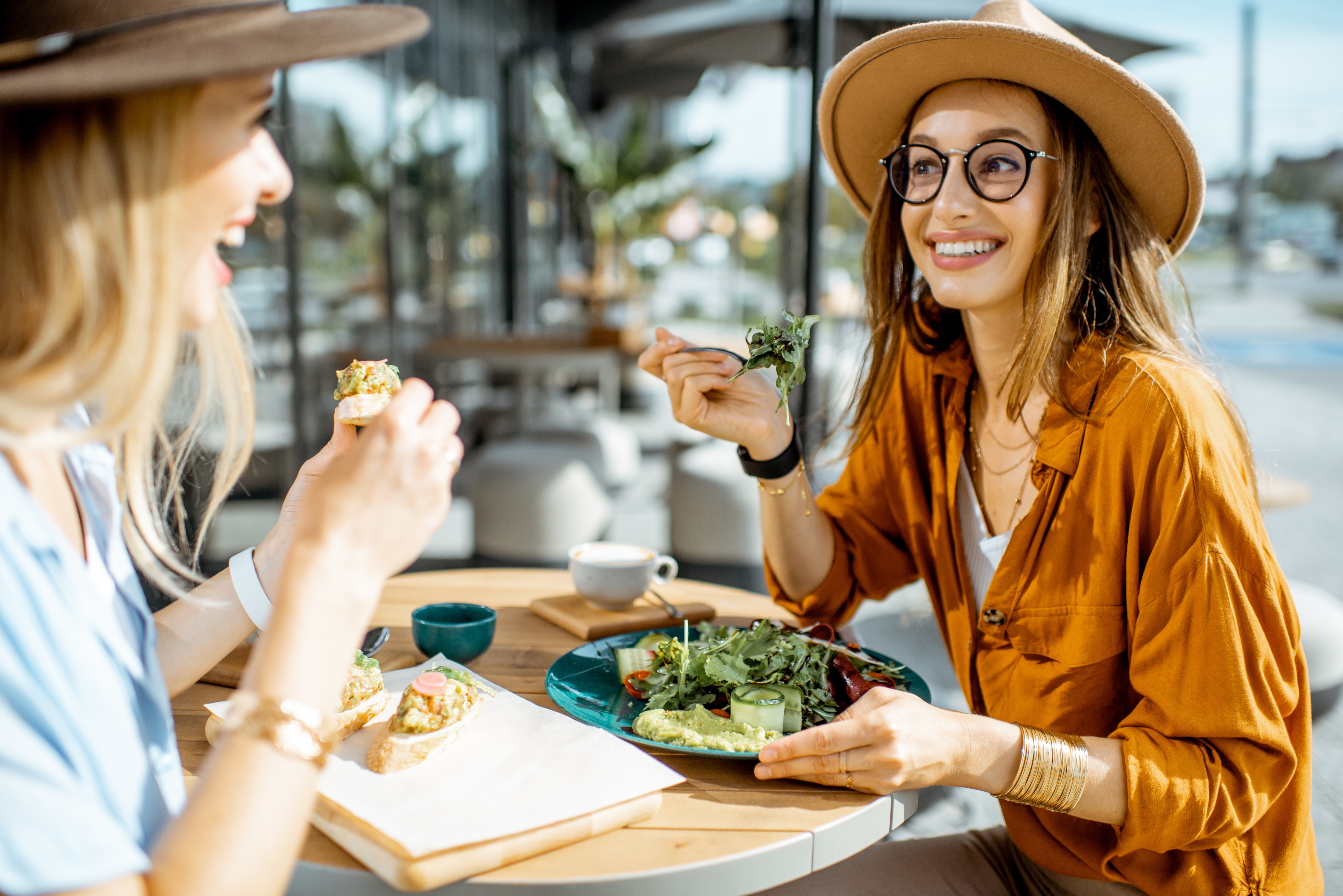 Girls eating salad stock image