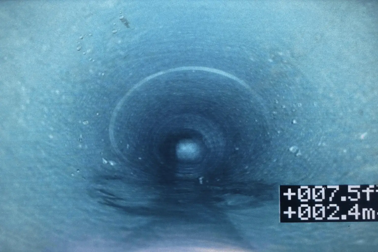 Drain camera footage after flex-shaft power flushing showing completely clean pipe - Hive 5 Plumbing Vaughan